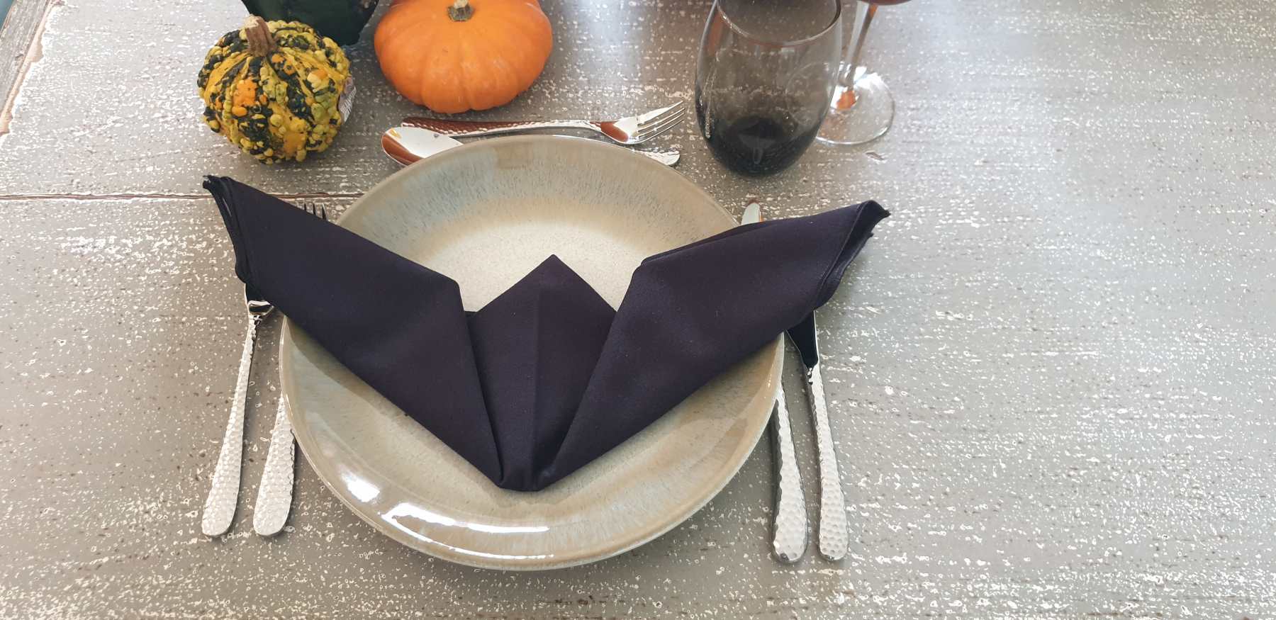 Black bat napkin from Halloween tableware hire range